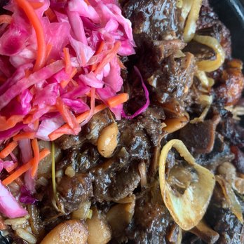 The Green Chicken - Oxtail special with red cabbage, rice & beans - Juice Bars & Smoothies Near Me - Miami, Florida The Green Chicken - Oxtail special with red cabbage, rice & beans - Juice Bars & Smoothies Near Me - Miami, Florida