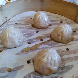 Pork XLB 4pcs - apparently different quality from Pork&Crab XLBs. Skin were soggy. From the way it looked - it was machine pleated. Pork XLB 4pcs - apparently different quality from Pork&Crab XLBs. Skin were soggy. From the way it looked - it was machine pleated.