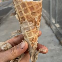Magpies Softserve - Napping stuck all over priced cone.