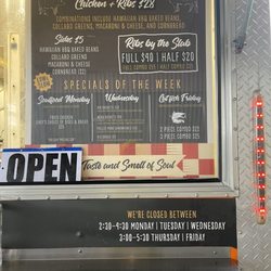 JoJo's Soul Food and Memphis BBQ - The sign of week's specials and times