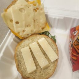 I ordered a GRILLED CHEESE" on a panini for $12.95.  I thought a grilled cheese meant the cheese was melted and the bread was toasted.