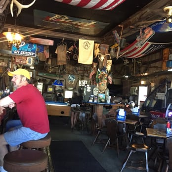 Blue Ox - a man sitting at a bar - Bars Near Me - Baileys Harbor, Wisconsin