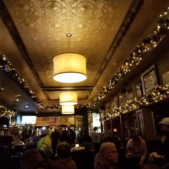 Lady Gregory's - Just to see the atmosphere. There were a group of musicians playing some. Christmas songs - New American Near Me - Chicago, Illinois Lady Gregory's - Just to see the atmosphere. There were a group of musicians playing some. Christmas songs - New American Near Me - Chicago, Illinois