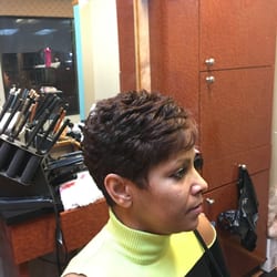 Beautifully straightened, cut and styled.