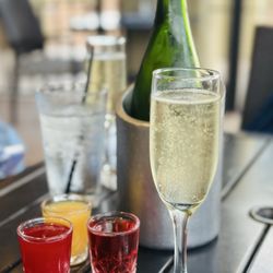$15 bottle of bubbles with 3 juices