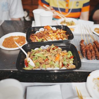 Xi Top Barbeque - a table full of food - Korean Near Me - Flushing, New York