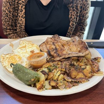 Rodeo Cafe - (2) Pork-chops and eggs w/ Rodeo Potatoes - Breakfast & Brunch Near Me - Corona, California Rodeo Cafe - (2) Pork-chops and eggs w/ Rodeo Potatoes - Breakfast & Brunch Near Me - Corona, California