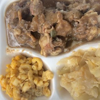 Shut Em Down Authentic Southern Restaurant - Stewed Oxtail over Mashed Potatoes - Southern Near Me - Jacksonville, Florida
