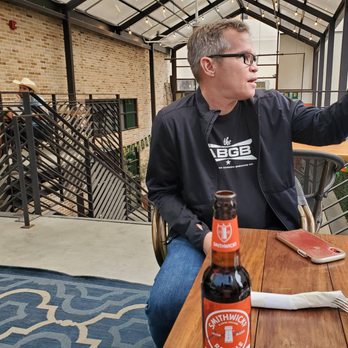Foxy's Proper Pub - This is my amazing husband as we sit upon the second-floor patio which had plenty of room and beautiful views. - Cocktail Bars Near Me - Austin, Texas Foxy's Proper Pub - This is my amazing husband as we sit upon the second-floor patio which had plenty of room and beautiful views. - Cocktail Bars Near Me - Austin, Texas