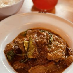 Hat Yai - Smoked Duck Curry ($18).  Spicy Smoked duck breast choochee style, with lime leaf, coconut milk + thai basil.
