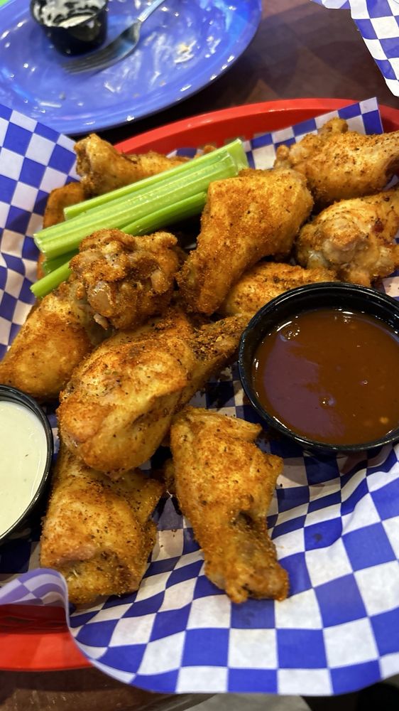 Wings with Cajun seasoning and mango habanero on the side. Yelp