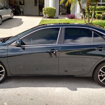 Tint Man Window Tinting Winter Park - Llumar CTX 15 side view 2015 Camry XSE v6 Cosmic Gray Mica (looks metallic blueish Green) - Car Window Tinting Near Me - Winter Park, Florida Tint Man Window Tinting Winter Park - Llumar CTX 15 side view 2015 Camry XSE v6 Cosmic Gray Mica (looks metallic blueish Green) - Car Window Tinting Near Me - Winter Park, Florida