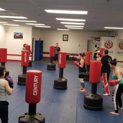 Shape Up Kickboxing - Flowery Branch - Punching & Kicking the bags is so much fun!