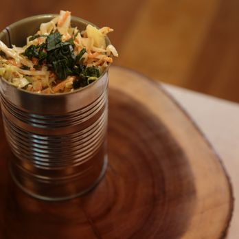 Beast BBQ - a can of coleslaw on a wooden plate - Barbeque Near Me - New York, New York Beast BBQ - a can of coleslaw on a wooden plate - Barbeque Near Me - New York, New York