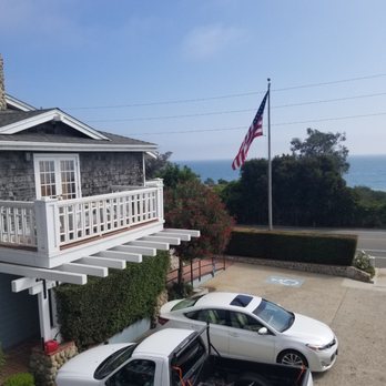 Inn On Summerhill - The front of hotel from room facing ocean - Bed & Breakfast Near Me - Summerland, California
