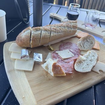 Stone Mountain Vineyards - Charcuterie board. We opted for meats/cheese and baguette. But they have other variations if you wanted fruit or jams or just cheese etc. - Wineries Near Me - Dyke, Virginia