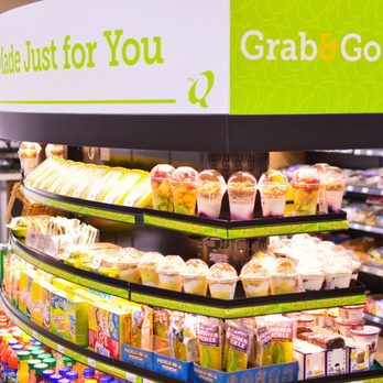 QMart - a display of food in a grocery store - Gas Stations Near Me - Round Rock, Texas