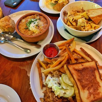 Stillwater - food spread w/ Braised Lamb Ragu in upper right corner - Cocktail Bars Near Me - Boston, Massachusetts Stillwater - food spread w/ Braised Lamb Ragu in upper right corner - Cocktail Bars Near Me - Boston, Massachusetts