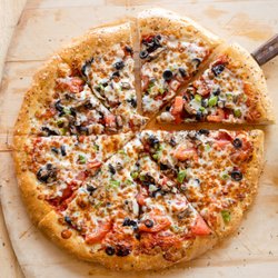 Zollo's Pizza - Our Veggie Pizza is topped with tomatoes, mushrooms, onions, green peppers and black olives and finely shredded Italian mozzarella cheese!