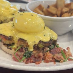 Crab cakes Benedict is flavorful and a huge portion Crab cakes Benedict is flavorful and a huge portion