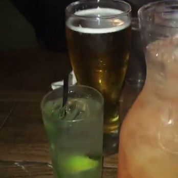 Saddle Ranch - Great selection of drinks!! I recommend the Arizona sunset (the largest one in the pic lol) - Steakhouses Near Me - Orange, California