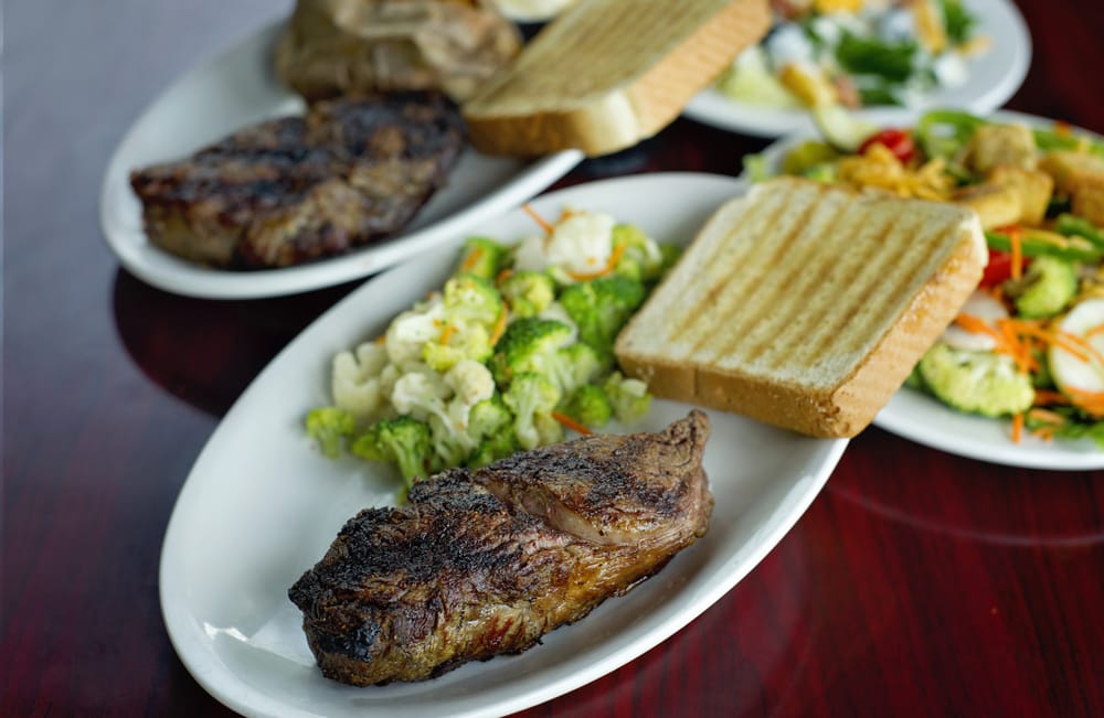 Ribeyes Steakhouse Logo