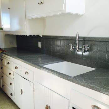 Discovery Coatings - This is a granite painted counter that covers over old, chipped yellow tiles.(not ready to rip out this retro kitchen yet!) - Refinishing Services Near Me Discovery Coatings - This is a granite painted counter that covers over old, chipped yellow tiles.(not ready to rip out this retro kitchen yet!) - Refinishing Services Near Me
