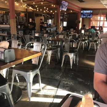 Crawfish Cave - Seating area - Cajun/Creole Near Me - Fullerton, California Crawfish Cave - Seating area - Cajun/Creole Near Me - Fullerton, California