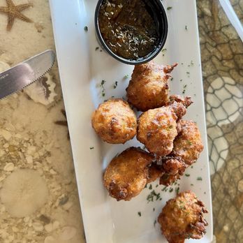 The Shack Riverfront - Conch fritters with marmalade jam - Seafood Near Me - Palm Bay, Florida The Shack Riverfront - Conch fritters with marmalade jam - Seafood Near Me - Palm Bay, Florida