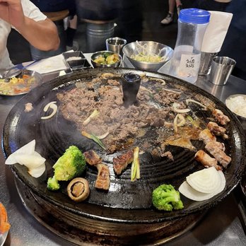 The Cast Iron Pot 3 - Bulgogi (Marinated Rib-eye roll) - Korean Near Me - Flushing, New York The Cast Iron Pot 3 - Bulgogi (Marinated Rib-eye roll) - Korean Near Me - Flushing, New York
