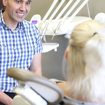 Eastport Dental Centre - Dr. Newman with NE Calgary dental patient - General Dentistry Near Me - Calgary, Alberta Eastport Dental Centre - Dr. Newman with NE Calgary dental patient - General Dentistry Near Me - Calgary, Alberta