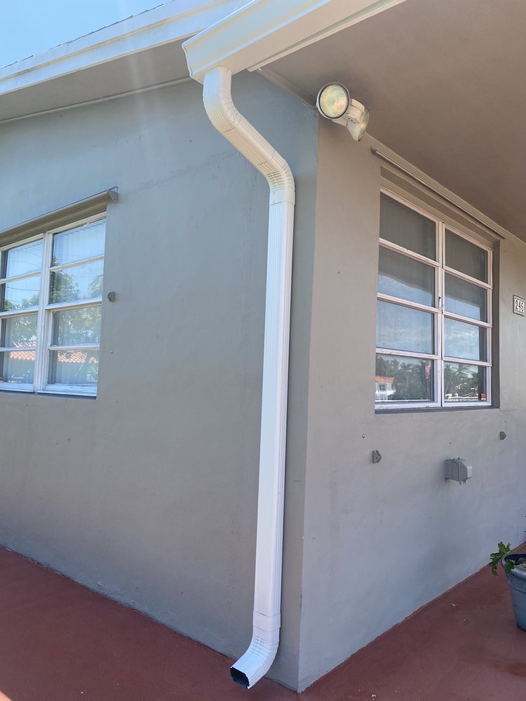 Slide of Del Toro Rain Gutters and Roofing