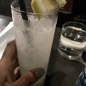 Roosevelt - Tom Collins with Tito's vodka - Cocktail Bars Near Me - Denver, Colorado Roosevelt - Tom Collins with Tito's vodka - Cocktail Bars Near Me - Denver, Colorado