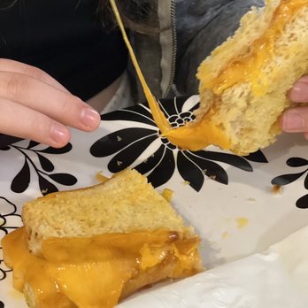 Main Street Kitchen - Grilled cheddar cheese on cheddar bread. Look at that cheese pull!!! - Cafes Near Me - Stoughton, Wisconsin Main Street Kitchen - Grilled cheddar cheese on cheddar bread. Look at that cheese pull!!! - Cafes Near Me - Stoughton, Wisconsin
