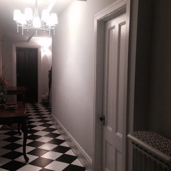 Black Wolf Renovations LLC - Gut renovation of ground floor hallway, full ceramic tile installation. - General Contractors Near Me - Brooklyn, New York