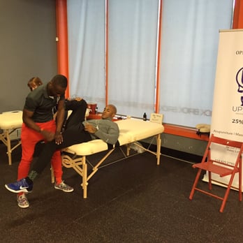 Mensah Chiropractic - Dr. Mike Mensah works on a Crossfit athlete before 16.1 mobility work = injury prevention. - Chiropractors Near Me - West Hollywood, California Mensah Chiropractic - Dr. Mike Mensah works on a Crossfit athlete before 16.1 mobility work = injury prevention. - Chiropractors Near Me - West Hollywood, California