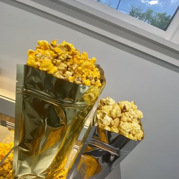 The Popcorn Treasury - a bag of popcorn and a bag of popcorn - Popcorn Shops Near Me - Indianapolis, Indiana
