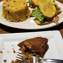 Jibarito and a ground beef and plantain empanada.