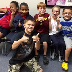 Tutoring Club - Our younger students were happy receiving their tokens for extra hard work!