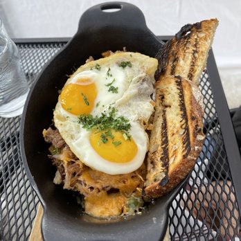 Centennial Crafted Beer & Eatery - Country Skillet with pork and eggs over easy - Beer Bar Near Me - Chicago, Illinois Centennial Crafted Beer & Eatery - Country Skillet with pork and eggs over easy - Beer Bar Near Me - Chicago, Illinois