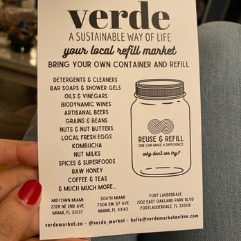 Verde Market - a person holding a jar of food - Organic Stores Near Me - South Miami, Florida Verde Market - a person holding a jar of food - Organic Stores Near Me - South Miami, Florida