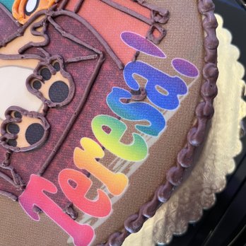 Edibles Incredible Desserts - Asked for basic lettering - the cake decorator at their discretion used this rainbow-microsoft-word-art font.... - Desserts Near Me - Sterling, Virginia