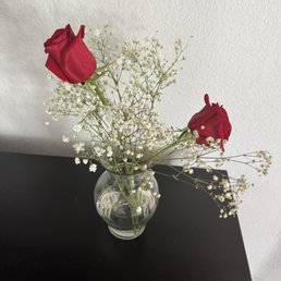 picked up two dozen red roses in a bouquet, when unwrapped, it was like a bunch of leftover pieces taped together to resemble a bouquet