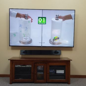 Telsat Communications - On wall Deluxe with sound bar TV wall mount - Home Theatre Installation Near Me Telsat Communications - On wall Deluxe with sound bar TV wall mount - Home Theatre Installation Near Me