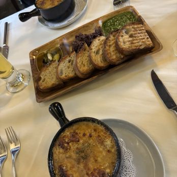 Rene At Tlaquepaque - French onion soup and bread service - French Near Me - Sedona, Arizona