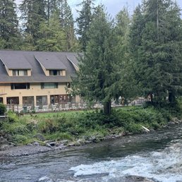 The back of the lodge from across the river The back of the lodge from across the river