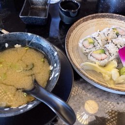 Miso soup and California maki. Miso soup and California maki.