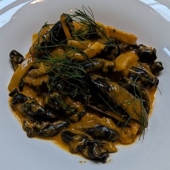 Mama - Squid ink pasta with calamari & myself in a tomato saffron broth - Italian Near Me - Oakland, California