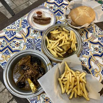 Merguez Restaurant - Lamb prune tagine & fries, chicken lemon olive  fresh baked Moroccan bread and the famous merguez (spicy lamb sausage) - Moroccan Near Me - Orlando, Florida
