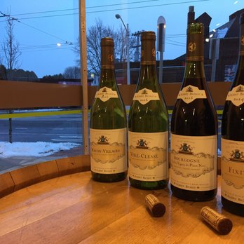 Art’s Specialties - three bottles of wine on a barrel - Specialty Food Near Me - Belmont, Massachusetts Art’s Specialties - three bottles of wine on a barrel - Specialty Food Near Me - Belmont, Massachusetts